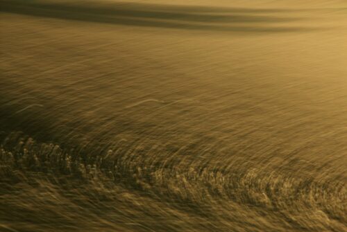 abstract photo art, a brown field turned into a pattern by motion blur